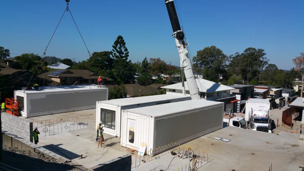 Importing modular buildings into Australia: a steel-framed module craned into place on an Australian residential site
